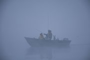 fishing from a boat in fog