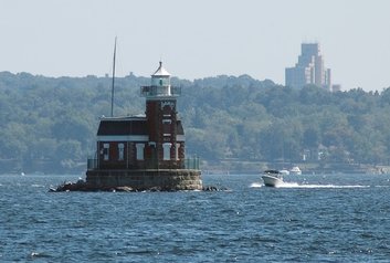 plotting a boating course with lighthouse